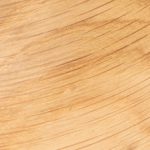 Natural wooden flooring showcasing smooth, polished timber planks with a warm, golden hue, ideal for contemporary home interior designs.